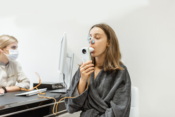 Young woman during a spirography test
