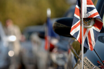 British Ambassador's car with the flag of the Union Jack with the Royal Coat of Arms, the official...