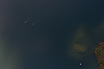 Aerial shots of lake islands and small boats