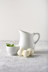 Set of sauces, seasonings for dishes and mozzarella cheese , served in white bowls Copyspace