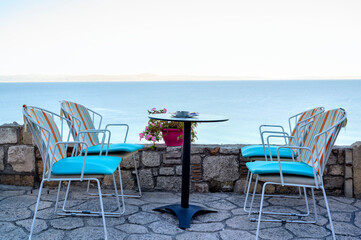 Empty restaurant terrace table in Afitos, Halkidiki, Greece