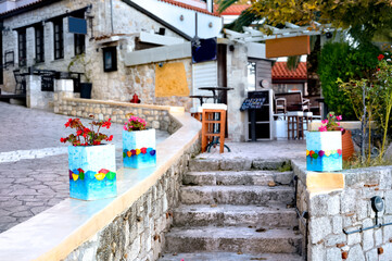 Flowers and restaurants in Afitos, Halkidiki, Greece