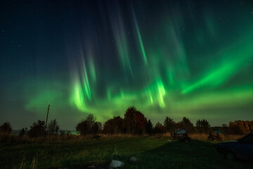 Fototapeta na wymiar Polar Lights over Lake Onega in Karelia. Russia. September 2020.
