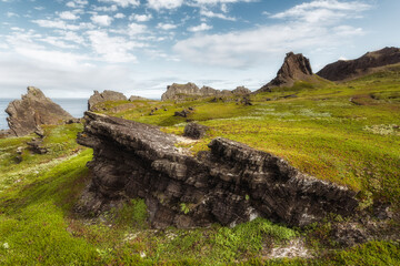 Fototapeta na wymiar The rocks of Cape Kekursky on the Rybachy peninsula. Russia, Murmansk region