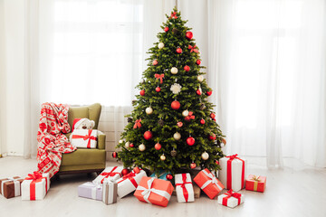 Fototapeta na wymiar Window decor new year presents Christmas tree interior holiday