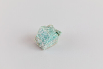 Turquoise. Stone, energetic quartz on a white background.