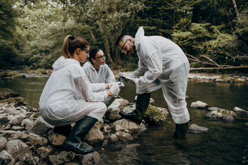 Team of scientists and biologists researching possibilities for bacteria and virus spreading through natural flowing supplies of drinking water.