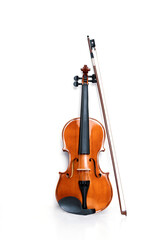 Fototapeta na wymiar Violin and bow on a white background. Classical musical instrument.