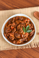 Spicy beef curry. Goan style beef vindaloo. Traditional Indian Lamb or beef curry . spicy Beef curry gravy popular in Kerala Sri Lankan Goa for Appam, Parotta porotta in India.