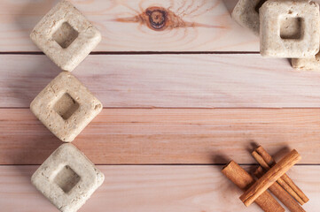 Eco friendly natural solid shampoo and hair conditioner on wooden background. Concept animal fat free, zero waste.