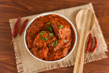 Spicy red fish curry  Goan style fish vindaloo ,  chilly  fish curry Indian Food curry Goa India . spicy Kerala Bengali fish curry side dish for Appam, rice , roti , chapati