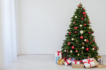 Decor new year interior of the christmas tree decor presents the holiday