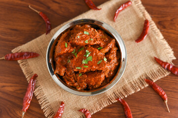 Spicy red fish curry  Goan style fish vindaloo ,  chilly  fish curry Indian Food curry Goa India . spicy Kerala Bengali fish curry side dish for Appam, rice , roti , chapati