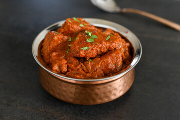 Spicy red fish curry  Goan style fish vindaloo ,  chilly  fish curry Indian Food curry Goa India . spicy Kerala Bengali fish curry side dish for Appam, rice , roti , chapati