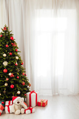 Window decor new year presents Christmas tree interior holiday