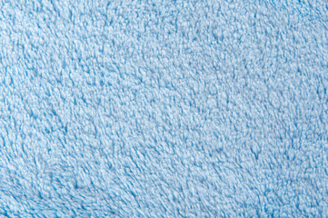Fototapeta na wymiar Blue fabric fluffy material texture background