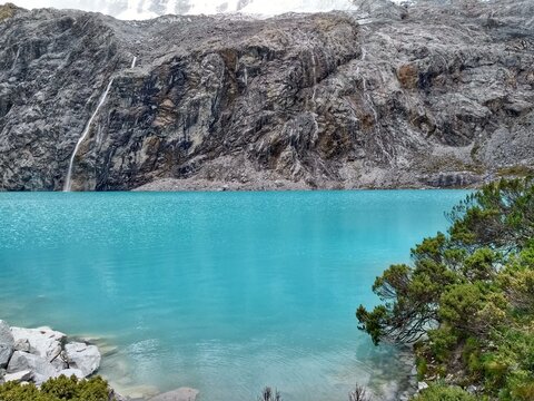 Laguna Paron, Huaraz, Peru. A blue-green lake in the Cordillera Blanca on the Peruvian Andes. At 4185 meters above sea level, it's surrounded by snowy peaks and a pyramid mountain. 