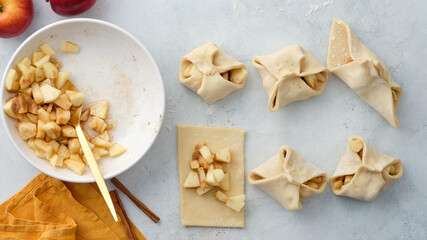 Puff pastry with apples, sugar and cinnamon. Autumn pastries.