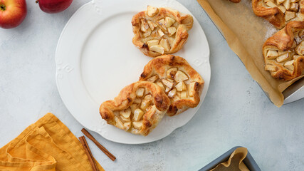 Puff pastry with apples, sugar and cinnamon. Autumn pastries.