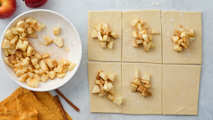 Puff pastry with apples, sugar and cinnamon. Autumn pastries.