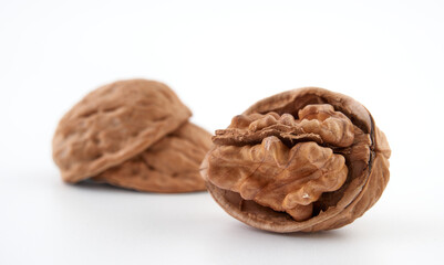 Walnuts in close-up, isolated on a white background.Space for text