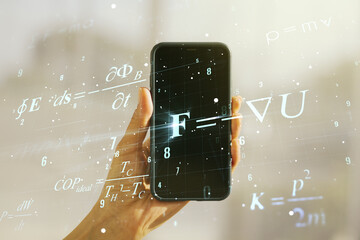 Creative scientific formula illustration and hand with mobile phone on background, science and research concept. Multiexposure