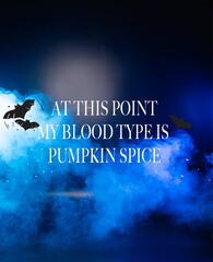at this point my blood type is pumpkin spice lettering dark blue background with smoke