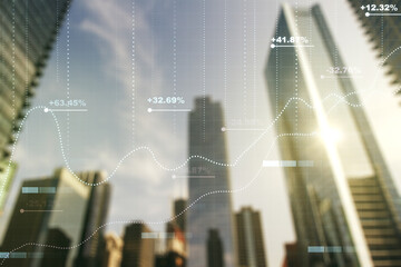Multi exposure of creative statistics data hologram on modern skyscrapers background, stats and analytics concept