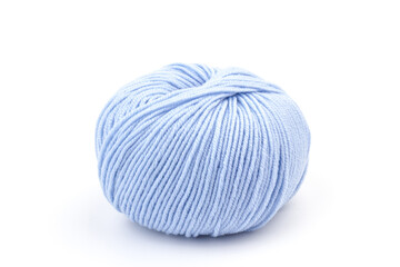 woolen merinos blue threads on white background. natural wool. knitting. background