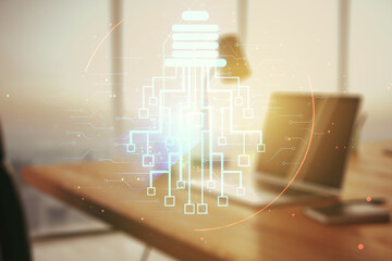 Creative light bulb with chip hologram on modern laptop background, artificial Intelligence and neural networks concept. Multiexposure