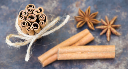  Cinnamon sticks and star anise in the kitchen. Thanksgiving or christmas cooking, decorations,...