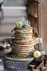 Two Tiered Chocolate Chip Cookie Wedding Cake With Dessert Table Barn Wedding