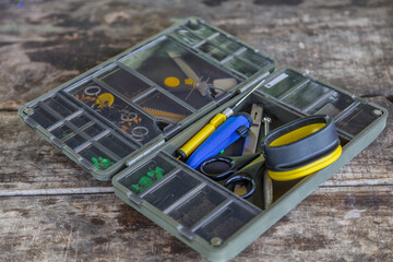 Fishing tackle on a wooden table.Carp fishing.carp fishing tool.