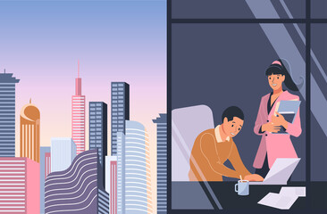 A woman and a man are working in the office. View from the window to the business building, cityscape. The boy is sitting at the laptop, the girl approached him with documents.