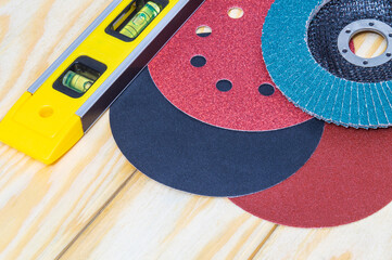 A set of abrasive tools and building level for cleaning or sanding various objects