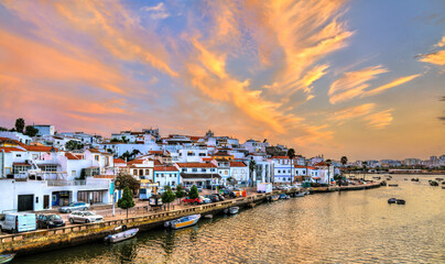 Fototapeta na wymiar Ferragudo, a traditional fishing village at sunset. Algarve, Portugal
