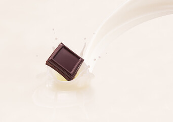 Falling black chocolate bar splashing into milk