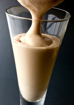 Close Up Of Butterscotch Scotch Eggnog Pouring In Glass