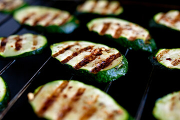 Close up of spicy grilled zucchini on cooling rack
