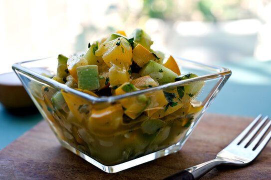 Close up of cumin scented summer squash salad in bowl