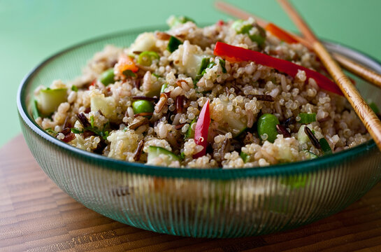 Close Up Of Quinoa And Wild Rice Salad With Ginger Sesame Dressing Served In Bowl