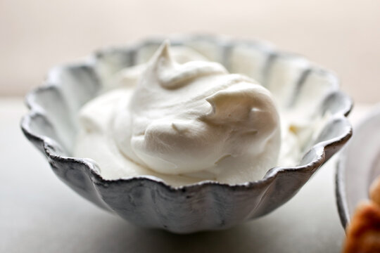 Close Up Of Mock Clotted Cream Served In Bowl