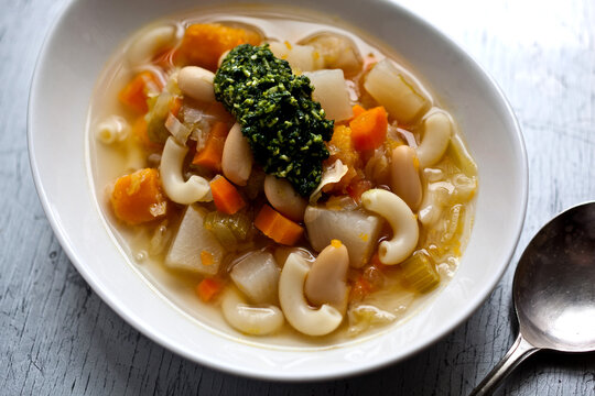 Close up of winter vegetable soupe au pistou served on table