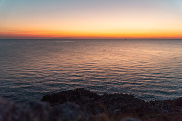Obraz premium A beautiful view over the ocean at sunset.