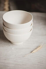 Clay pottery ceramic bowls drying on table.