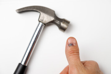 Man hit his finger with a hammer