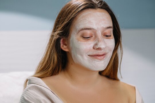 Crop face of woman with skincare mask