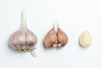 A set of garlic slices on a white background