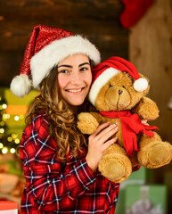 Fototapeta na wymiar so lovely. at the toy shop. decorate your holiday. christmas day is celebrated. new year tips and ideas. happy girl at xmas party. christmas shopping sales. happy santa woman bear toy present