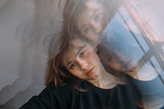 Surreal kaleidoscopic portrait of teenage girl